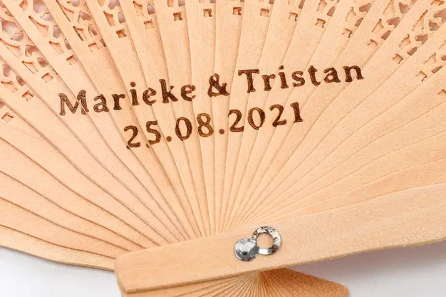 Personalized hand-carved bamboo hand fan