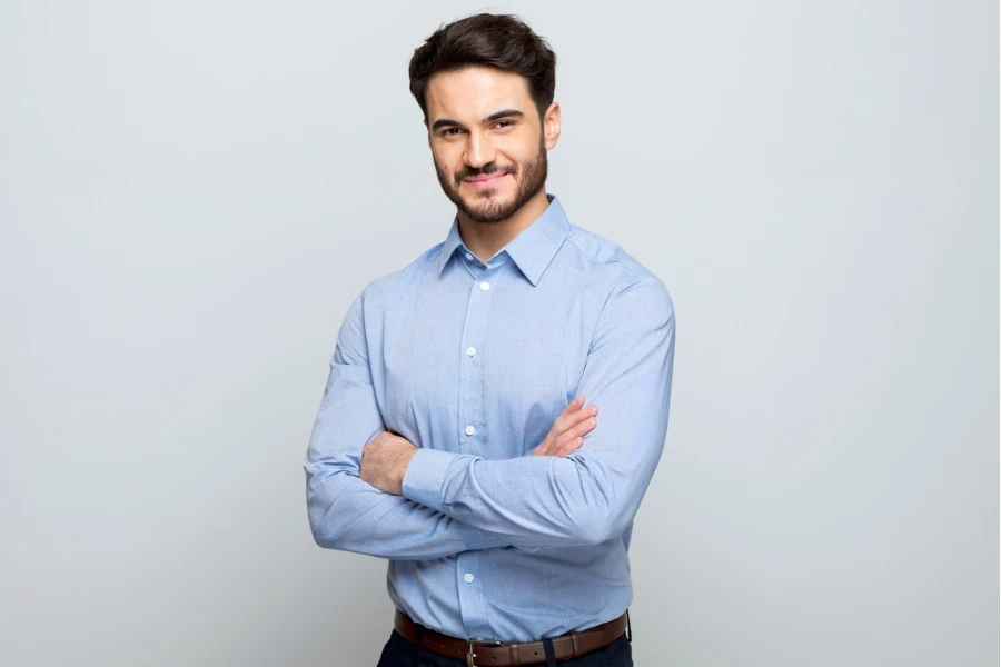 Portrait of bearded manager wearing blue shirt