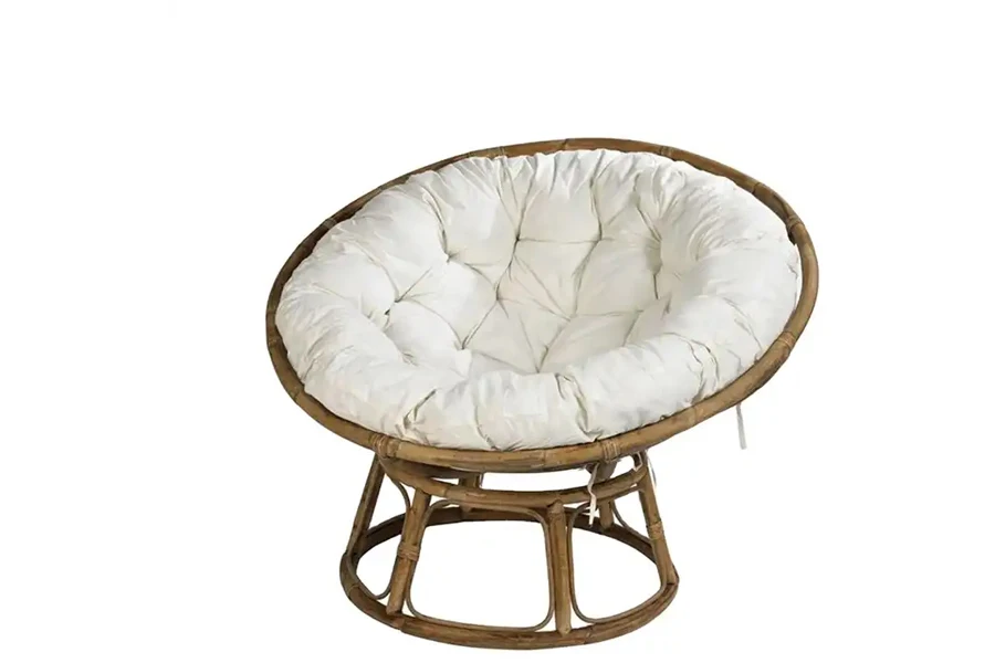 Rattan scoop or moon chair with padded white upholstery