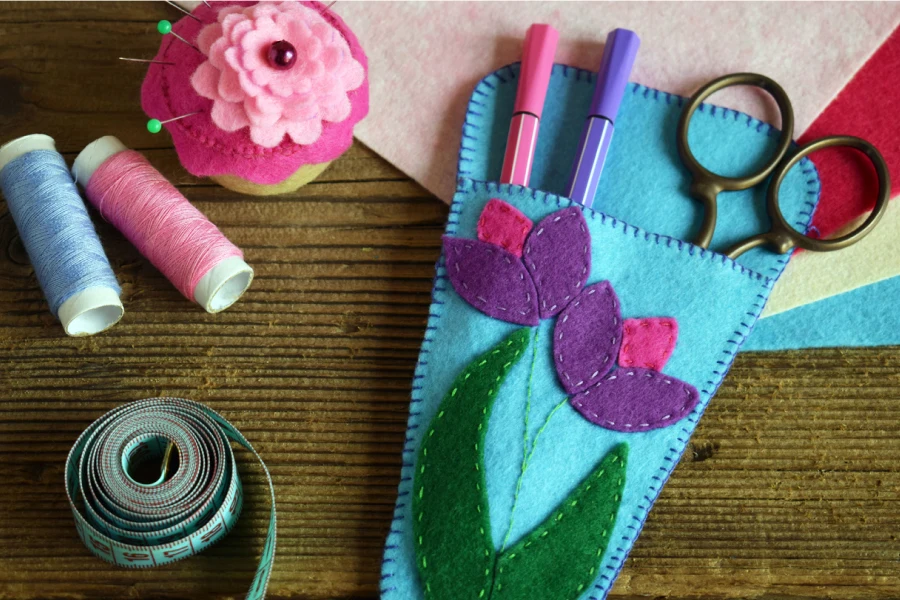 Sewing from felt with your own hands. DIY concept for children. Handmade crafts.
