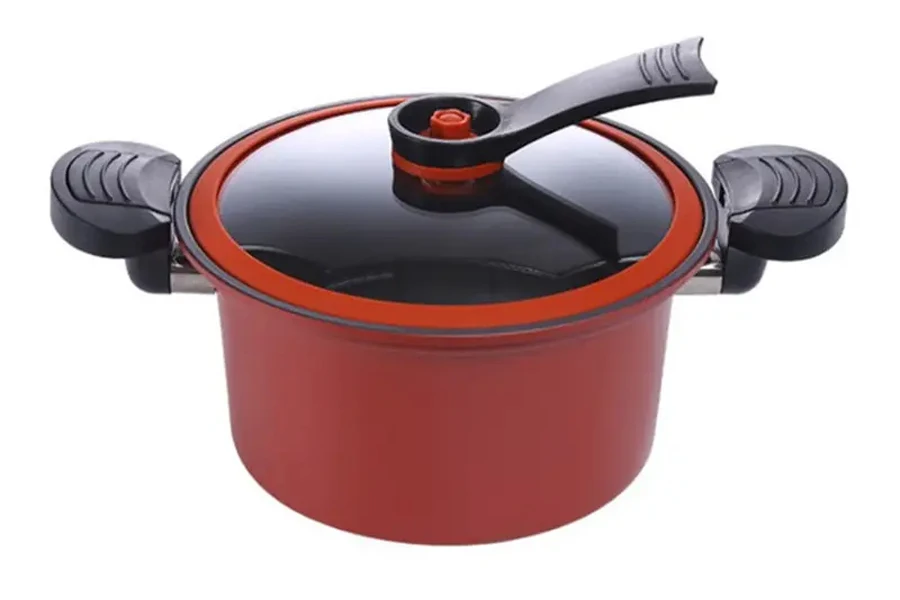 Small red stovetop pressure cooker with thickened base