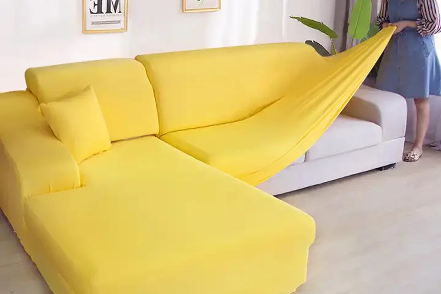 Solid yellow colored couch slipcover with matching cushions