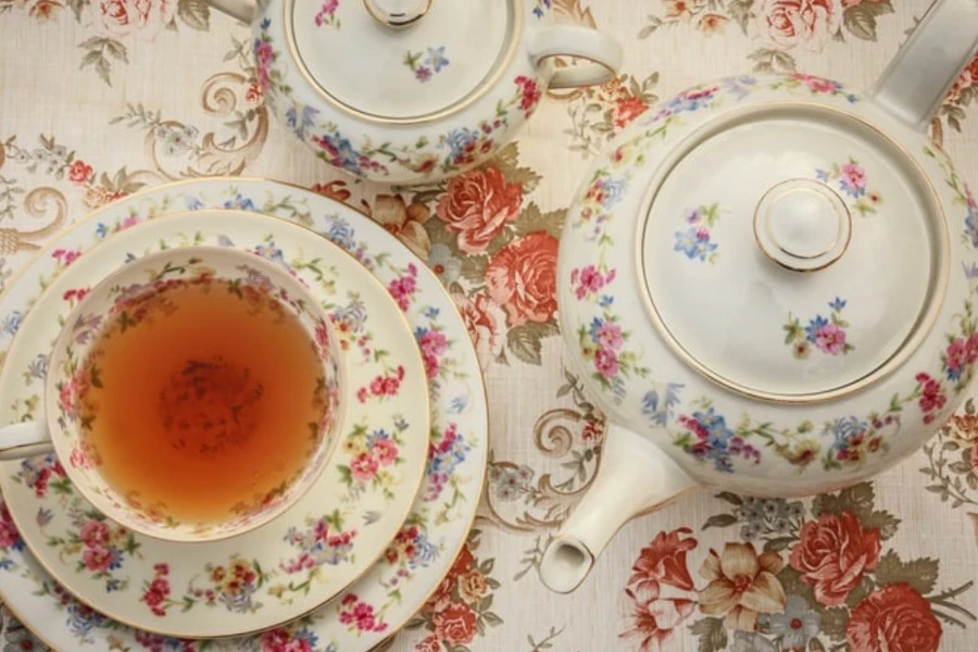 Teacup set on a floral table cover