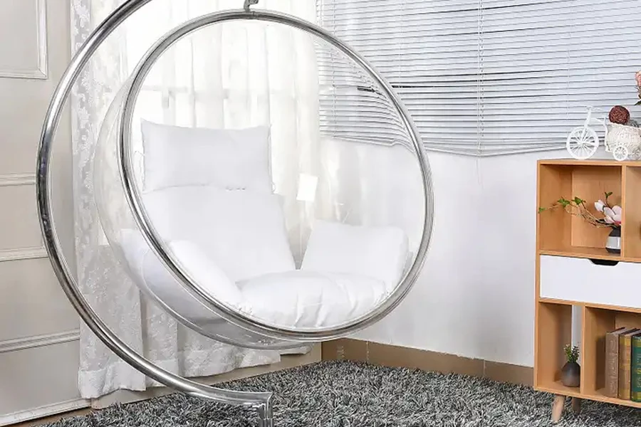 Transparent bubble chair on base with swing function