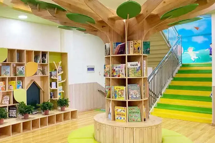 Tree-designed bookcase with seating for daycare center