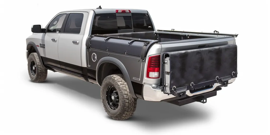 Truck with a leuk truck bed cover having an open cargo box