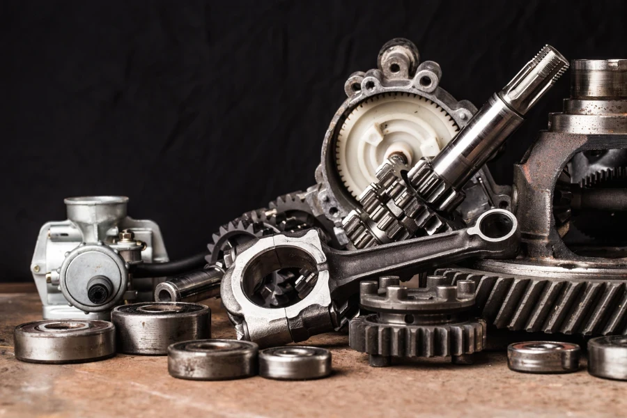 Various car parts and accessories, on black background