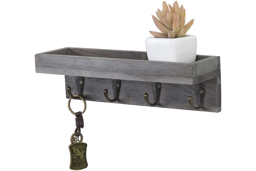 Vintage gray wooden entryway floating shelf with metal hooks