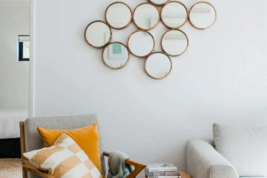 Wall mirror accents hung on a white wall