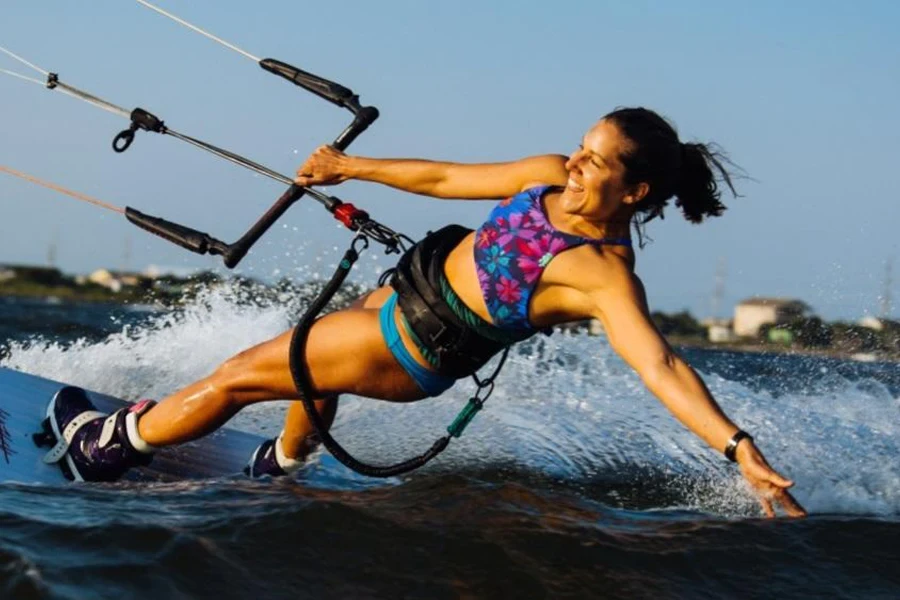 Woman enjoying her surfing time with a safety leash