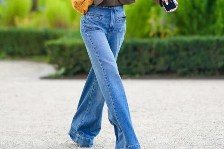 Woman strolling in a pair of straight jeans