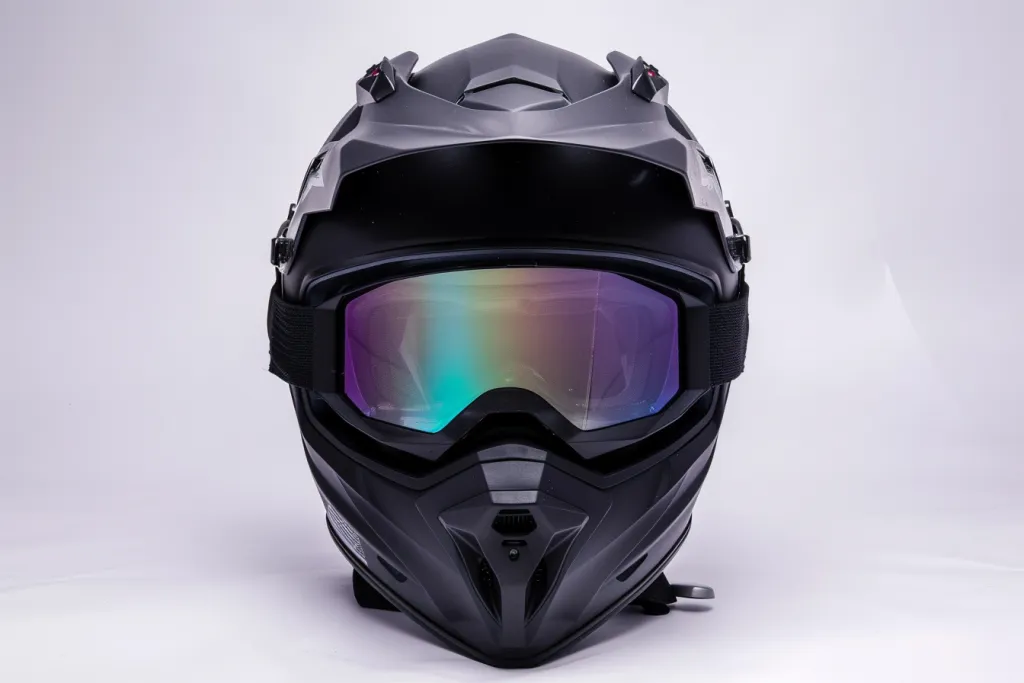 a black matte snowmobile helmet with clear visor