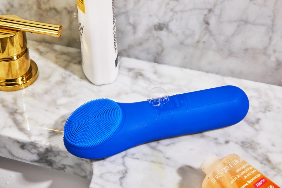 A blue sonic face cleansing brush