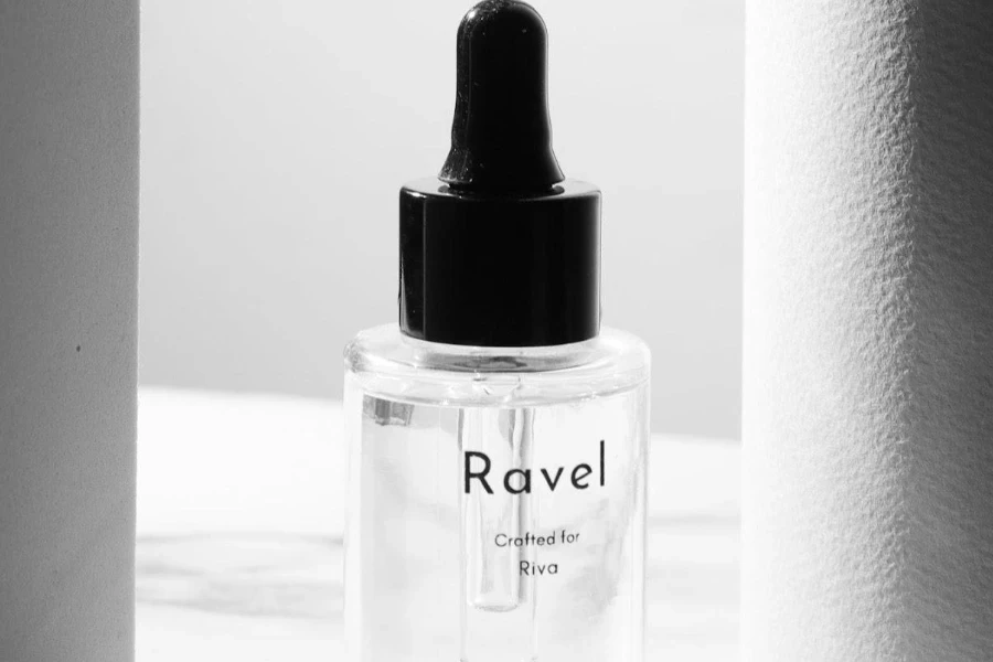 A bottle of transparent hair serum