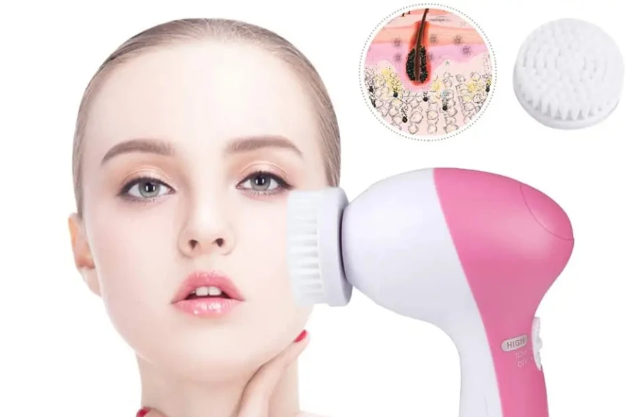 A face cleansing brush on a woman's face
