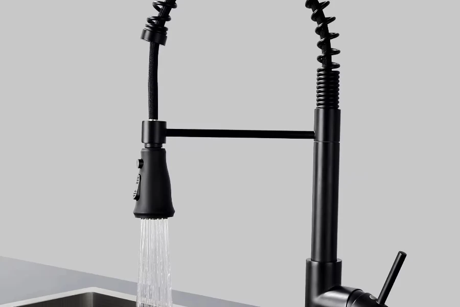 A matte black pull-out kitchen faucet