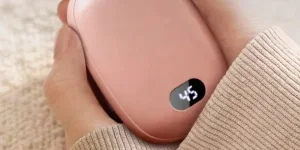 a pink rechargeable hand warmer