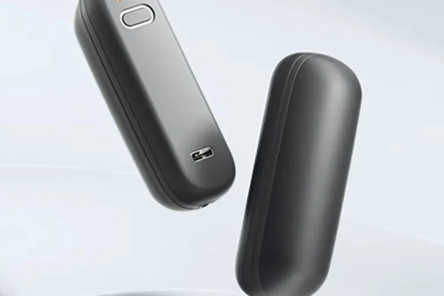 a two-part black rechargeable hand warmer