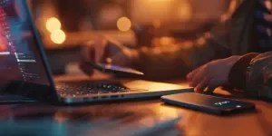 A person is using a mobile hard drive