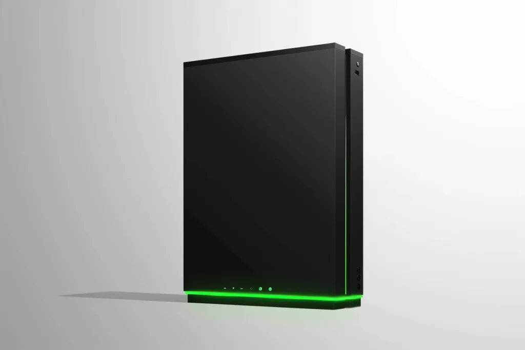 black hard drive with green lights on the bottom