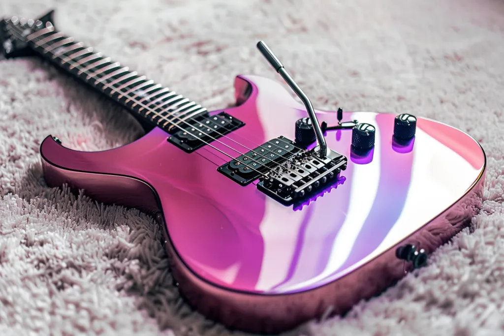 a pink electric guitar with black pick up
