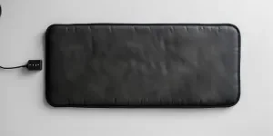 A black rectangular battery warmer