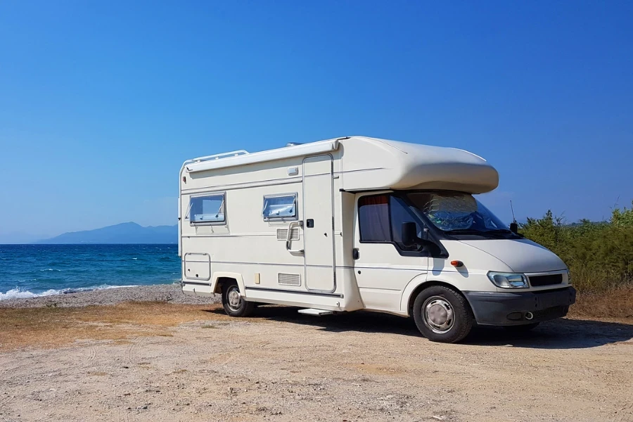 caravan car by the sea in summer holidays