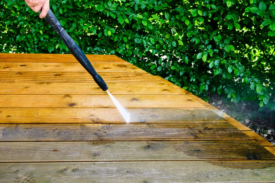 cleaning terrace with a power washer
