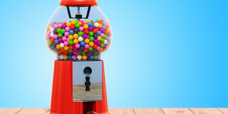 Gum dispenser on the wooden background
