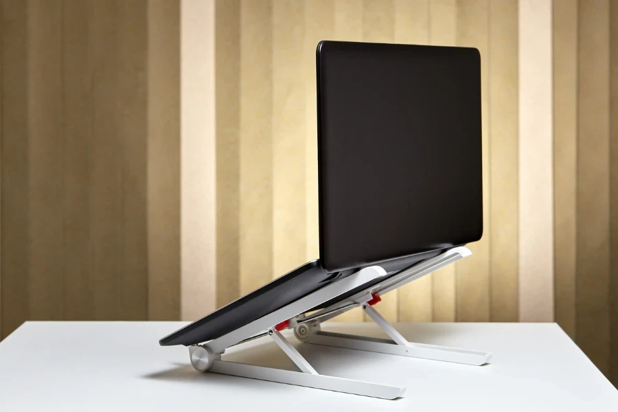 Adjustable portable aluminum laptop holder folding with open pc notebook