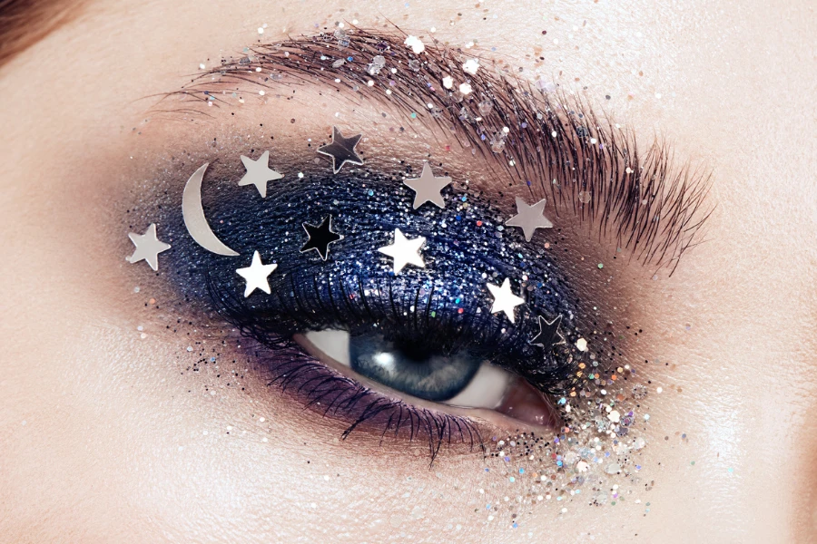 Eye makeup woman with decorative stars
