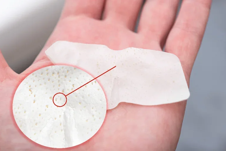 Close-up nose blackheads or black dots remove from pore of nose