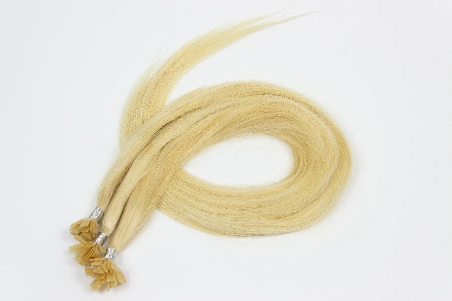 Tape in adhesive remy straight yellow human hair extensions