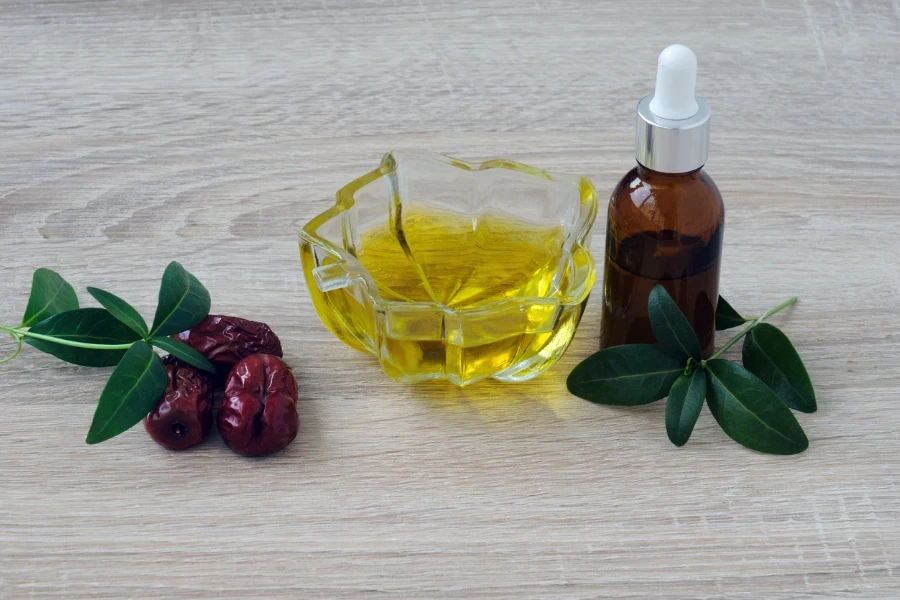 Jojoba oil in a transparent vase
