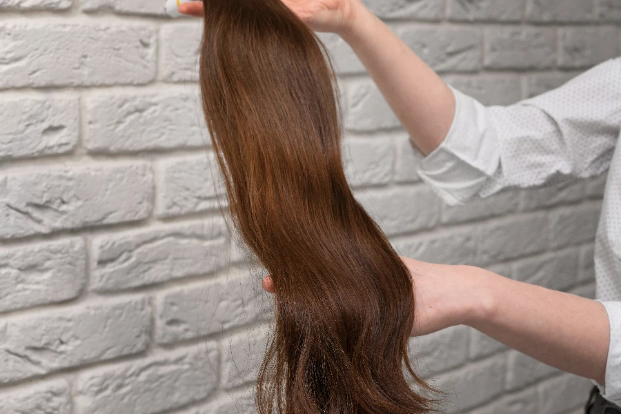 Styled hair extensions in beauty salon
