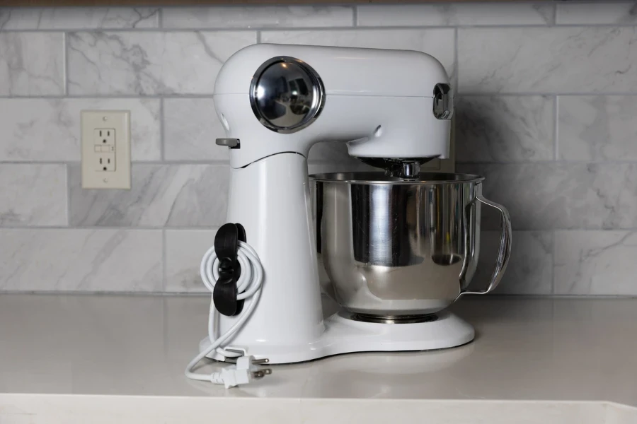 Stand mixer with a cord organizer
