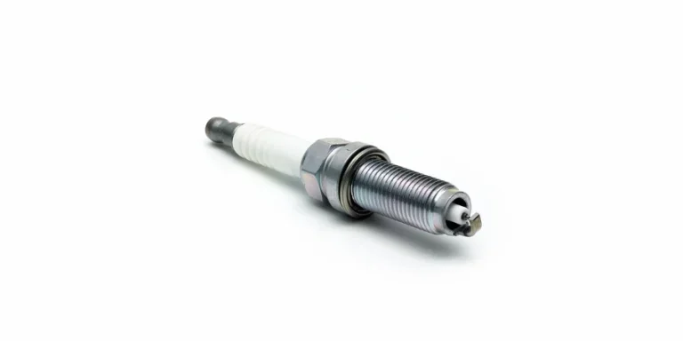 New spark plug on white background