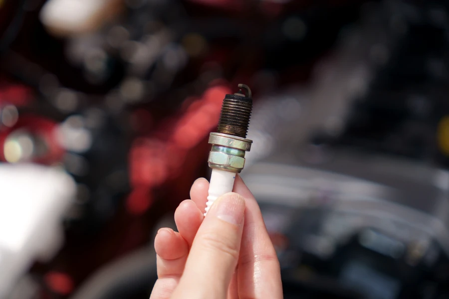 Deteriorated and blackened car spark plugs