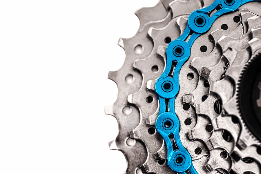 bicycle chain on MTB cassette on white
