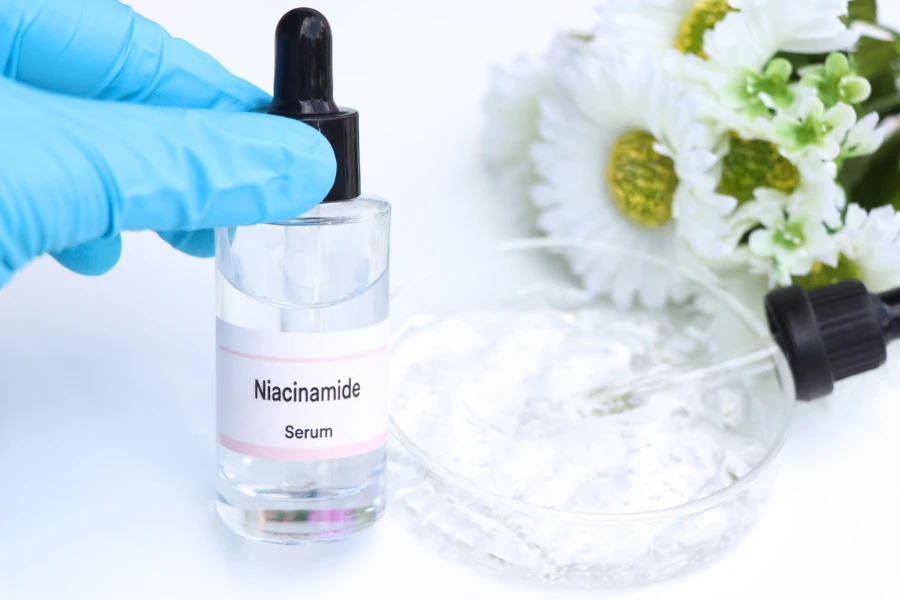 Cosmetic product in a bottle with a pipette
