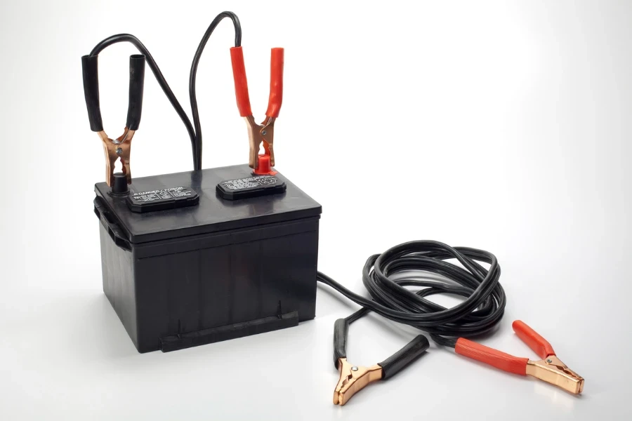 Electrical jumper cables properly connected to a car battery