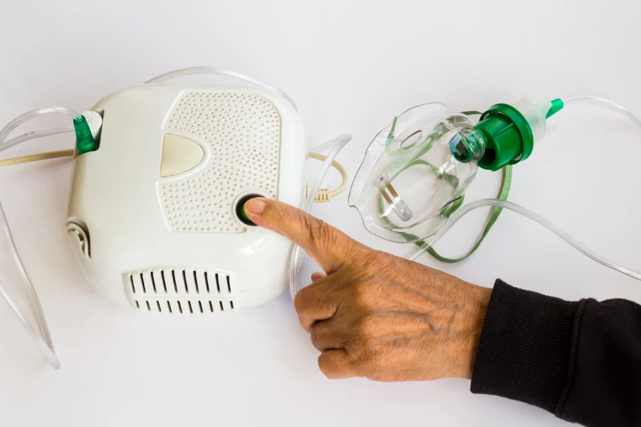 Close-up taken of home type mini air machine with oxygen mask
