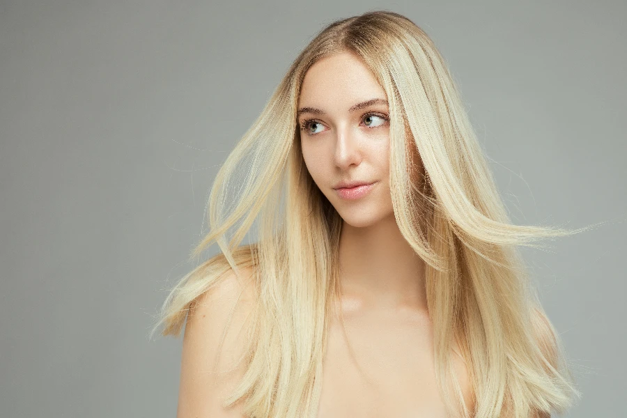 Beautiful Blondie Girl with Long Silk Hair
