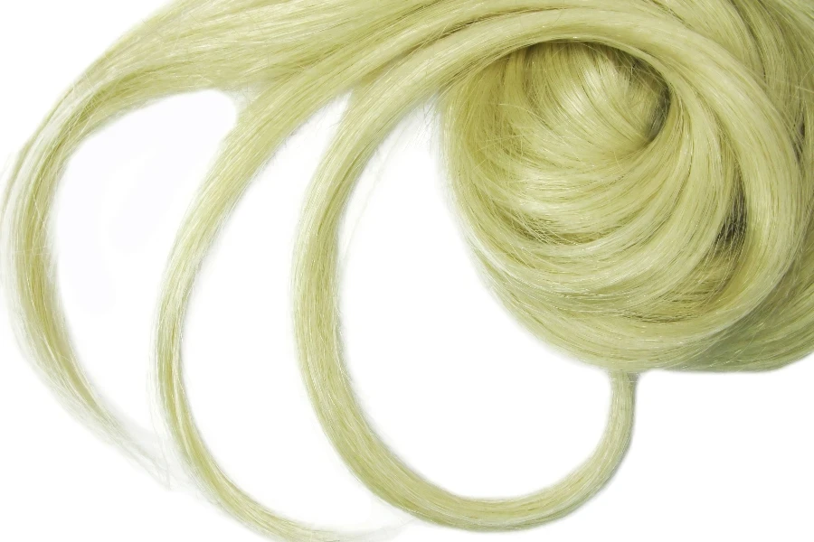 blond hair curls isolated on white background
