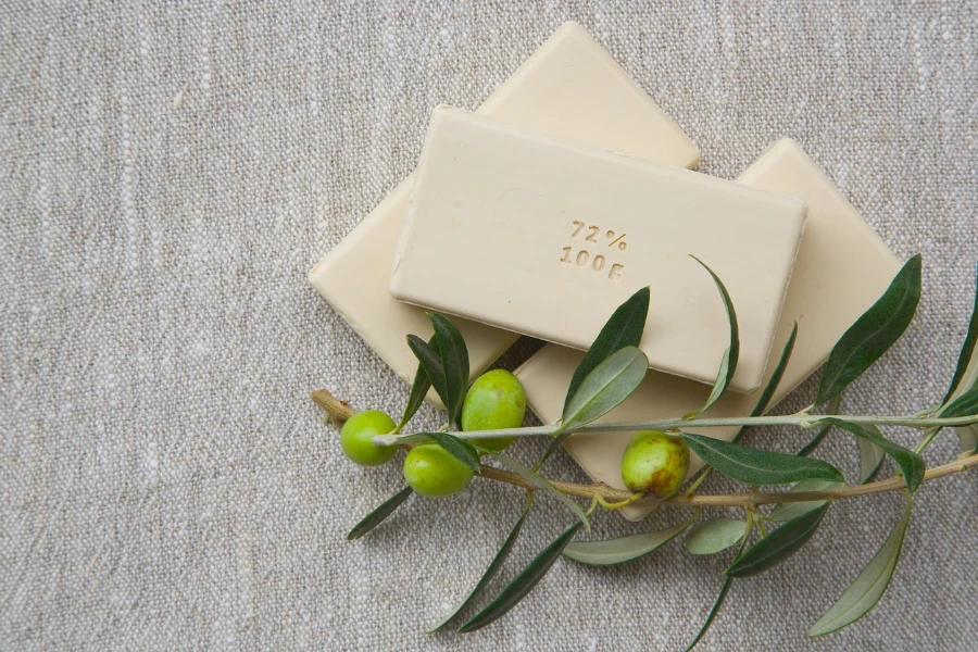 Soap bars with olive oil and olive tree twigs
