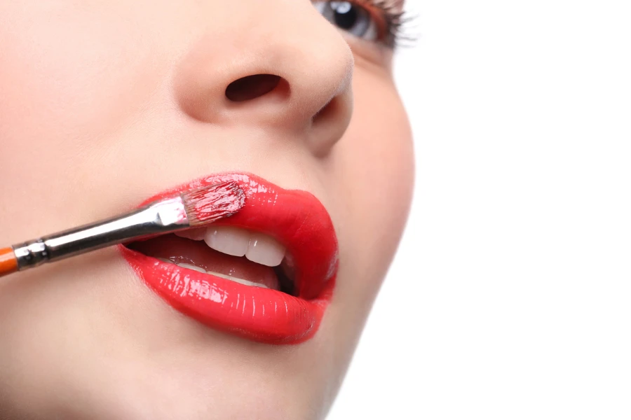 Apply lipstick with brush

