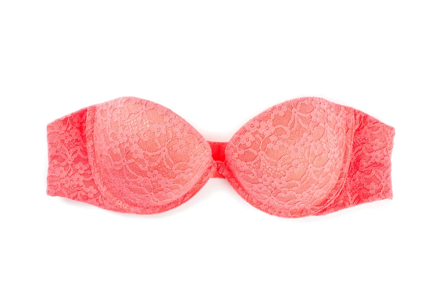 Closeup of a sexy pink lace strapless bra