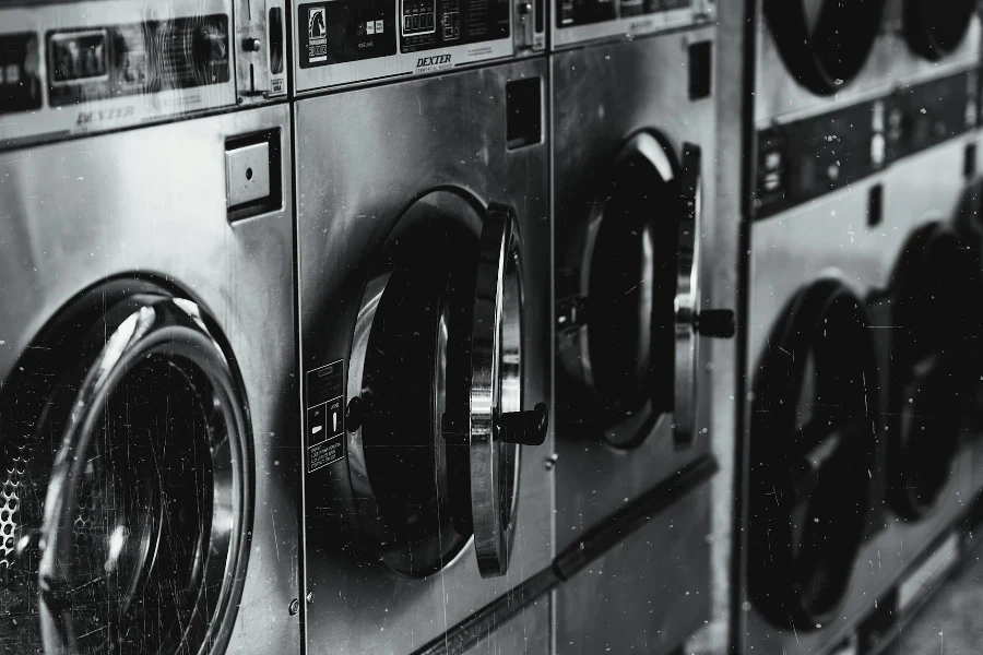 Grayscale Photo of Washing Machine