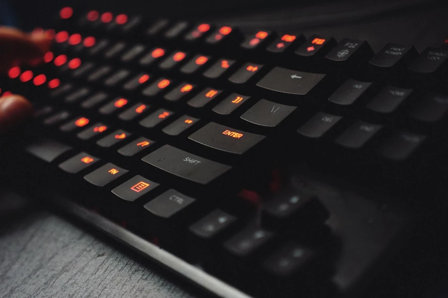 a black keyboard with orange lights