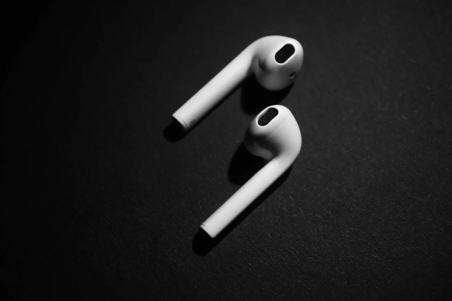 White Earpods on Black Background